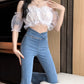 Højtaljede, elastiske micro flared jeans